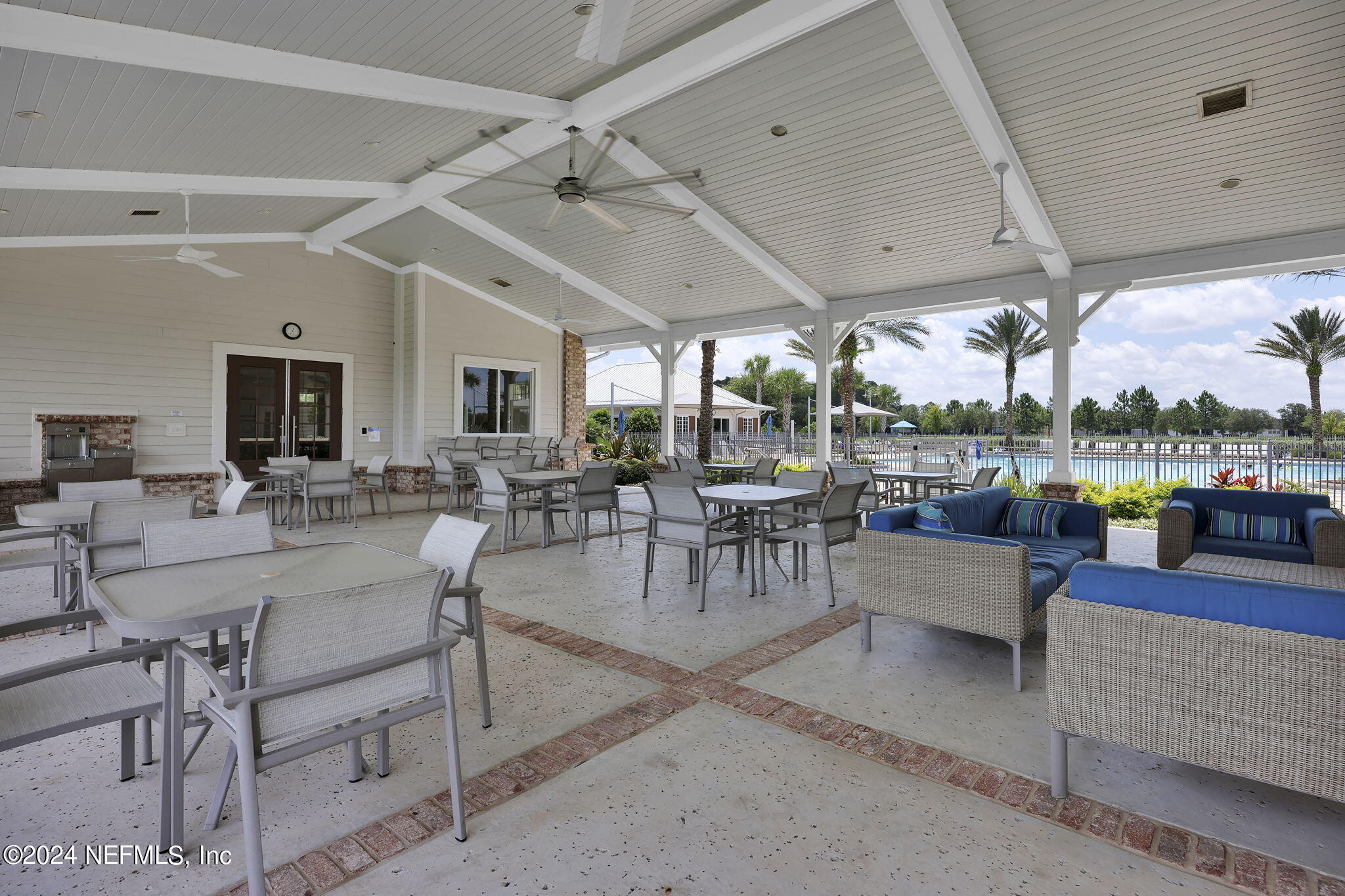 152 Flintlock Lane St. Augustine, FL 32095 - Photo 28 of 40 a view of a dining room with furniture window and outside view
