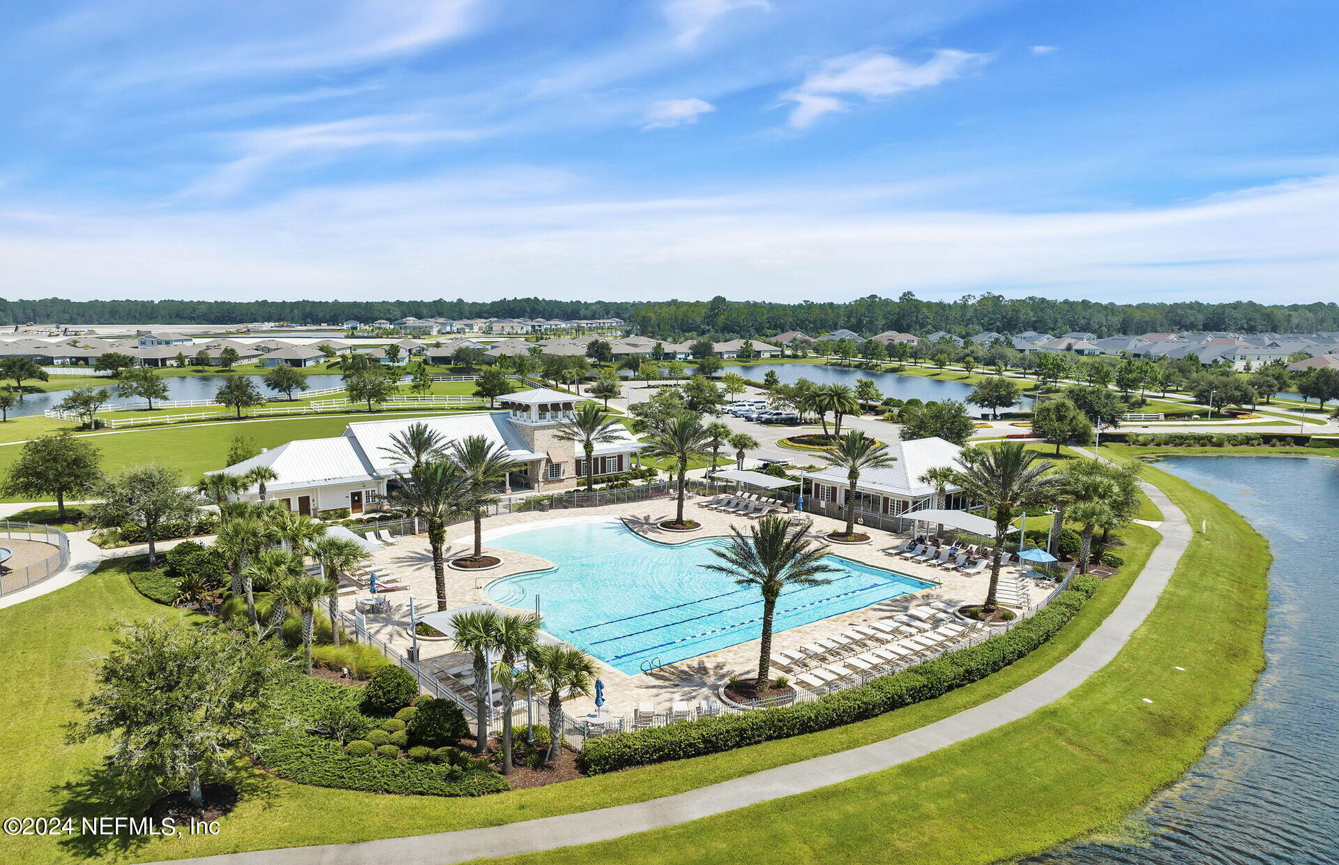 152 Flintlock Lane St. Augustine, FL 32095 - Photo 35 of 40 a view of a swimming pool with a patio