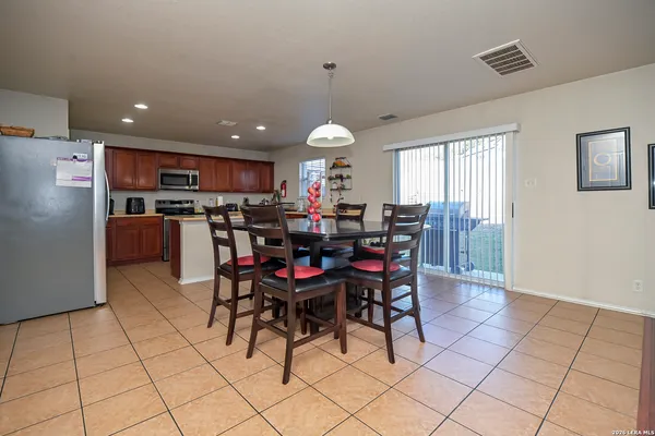 a view of a dining room with furniture