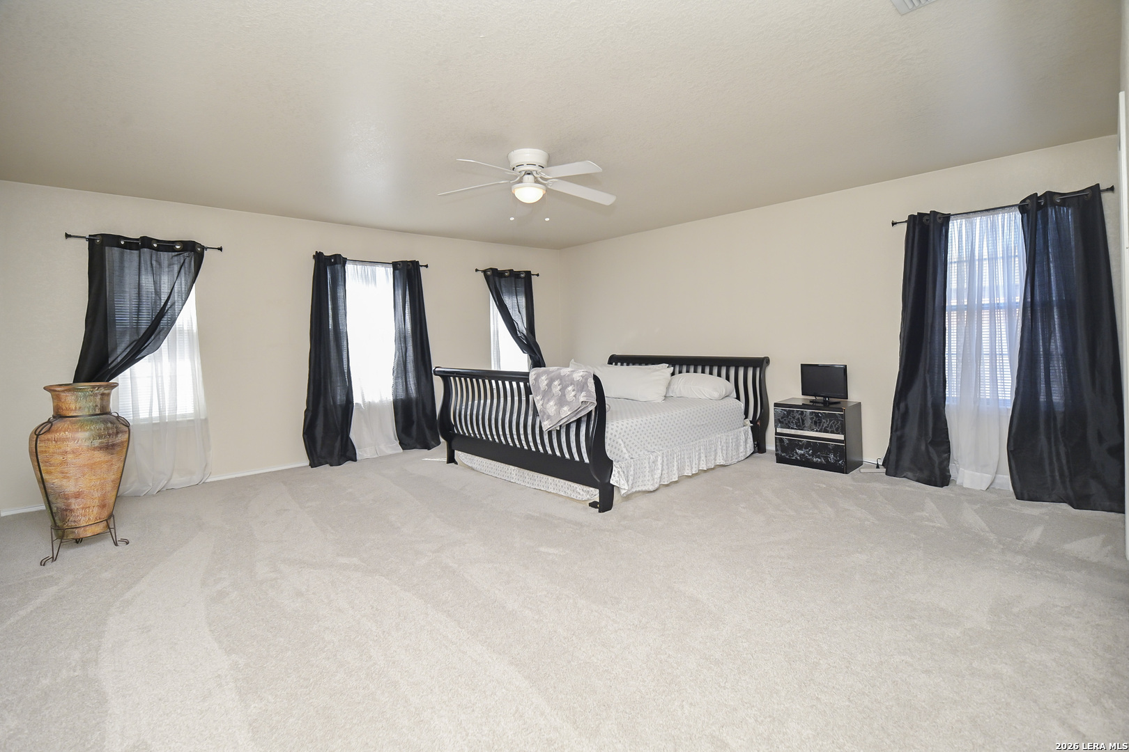 7207 Avery Road Live Oak, TX 78233 - Photo 28 of 42 a view of an empty room with window and stairs