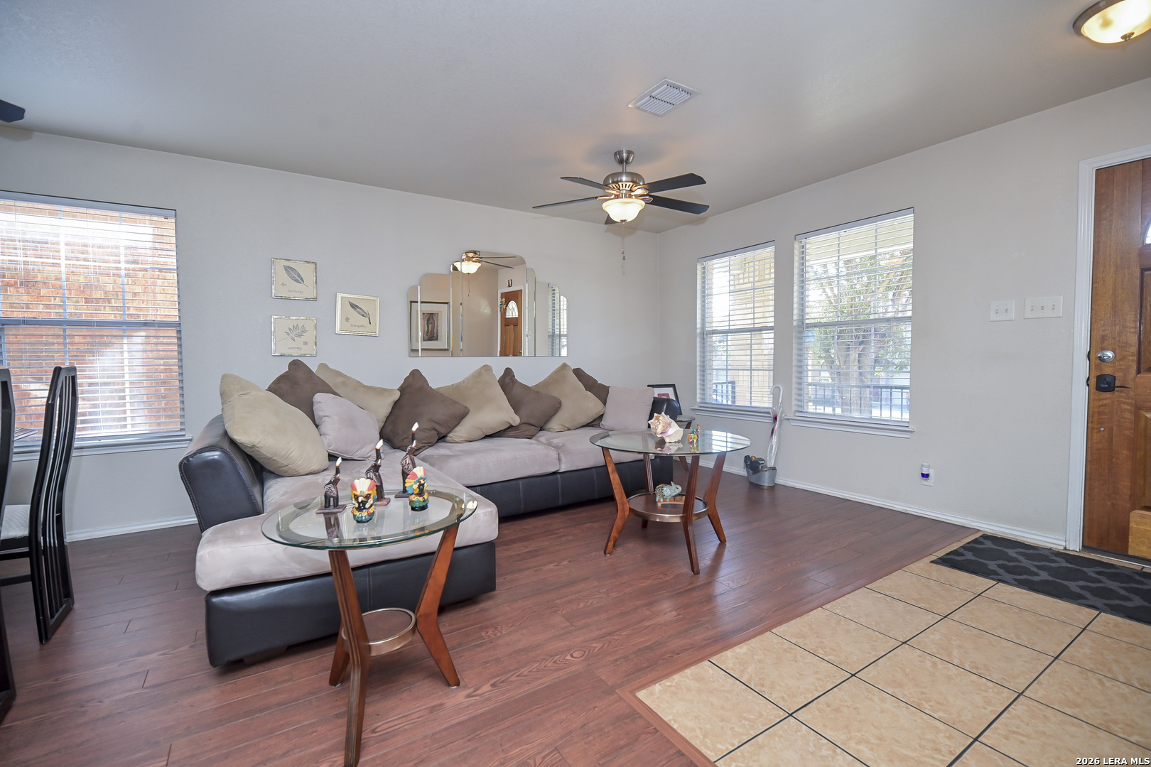 7207 Avery Road Live Oak, TX 78233 - Photo 8 of 42 a living room with furniture dining table and a window