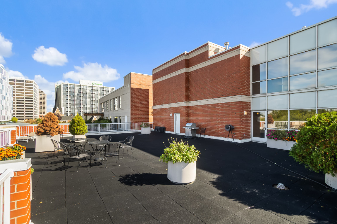 1415 Sherman Avenue, Unit 207 Evanston, IL 60201 - Photo 18 of 25 a view of a patio with couches and potted plants