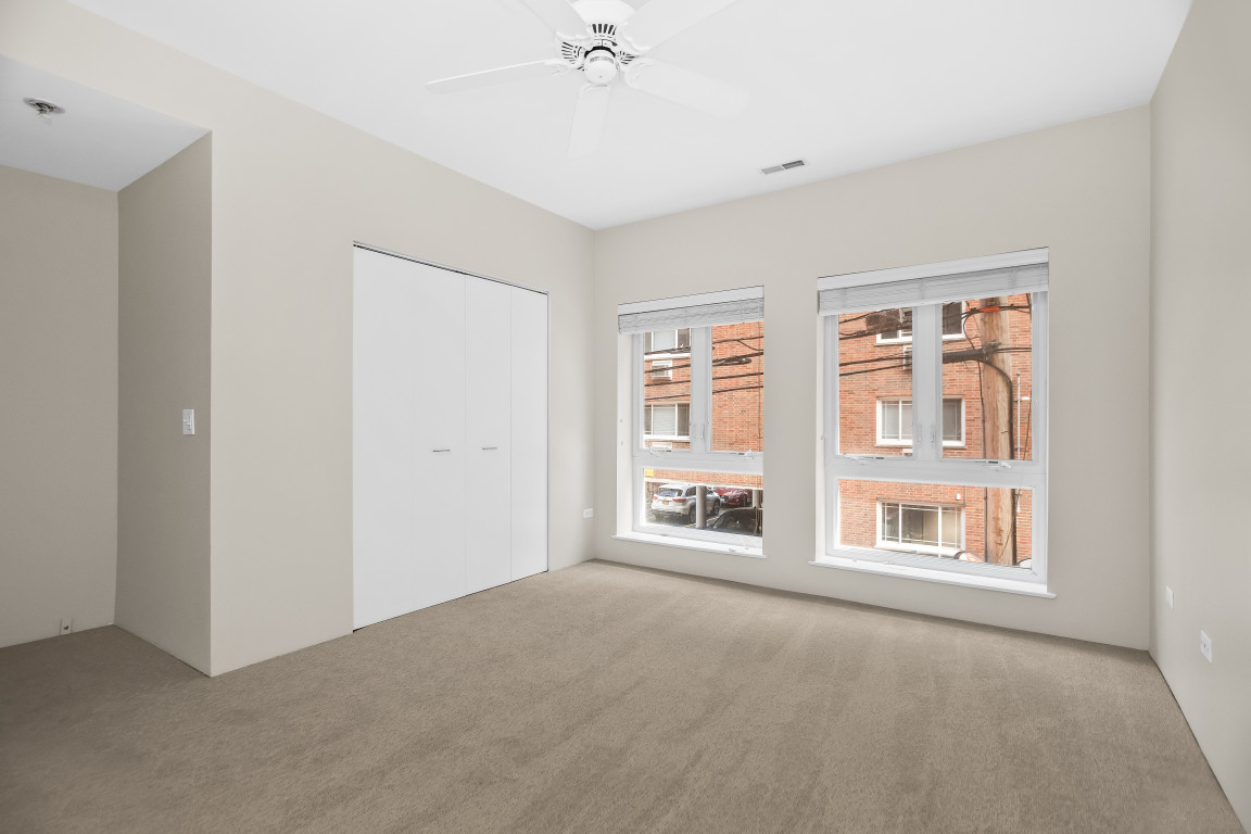 1415 Sherman Avenue, Unit 207 Evanston, IL 60201 - Photo 10 of 25 a view of an empty room with a window
