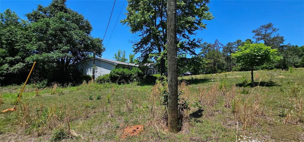 944 Lite-N-Tie Road Macon, GA 31211 - Photo 24 of 36 a backyard of a house with lots of green space