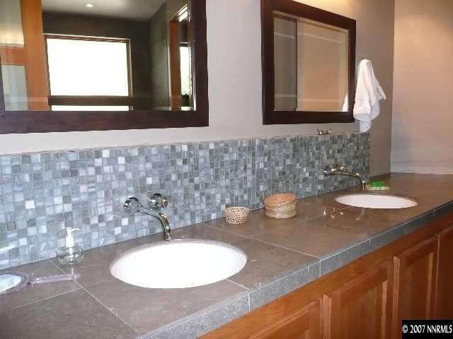 2385 Fireside Circle Reno, NV 89509 - Photo 9 of 9 a bathroom with a sink and a mirror