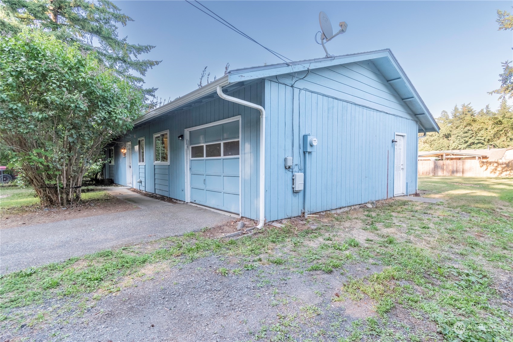 7154 Mecklem Road Everson, WA 98247 - Photo 19 of 25 a view of a house with backyard and garden