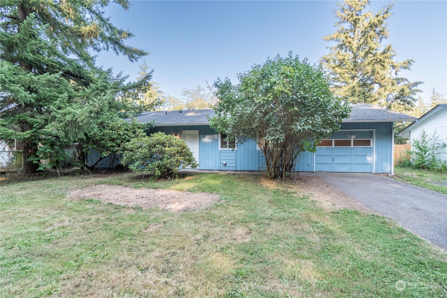 7154 Mecklem Road Everson, WA 98247 - Photo 20 of 25 a front view of a house with a yard and garage