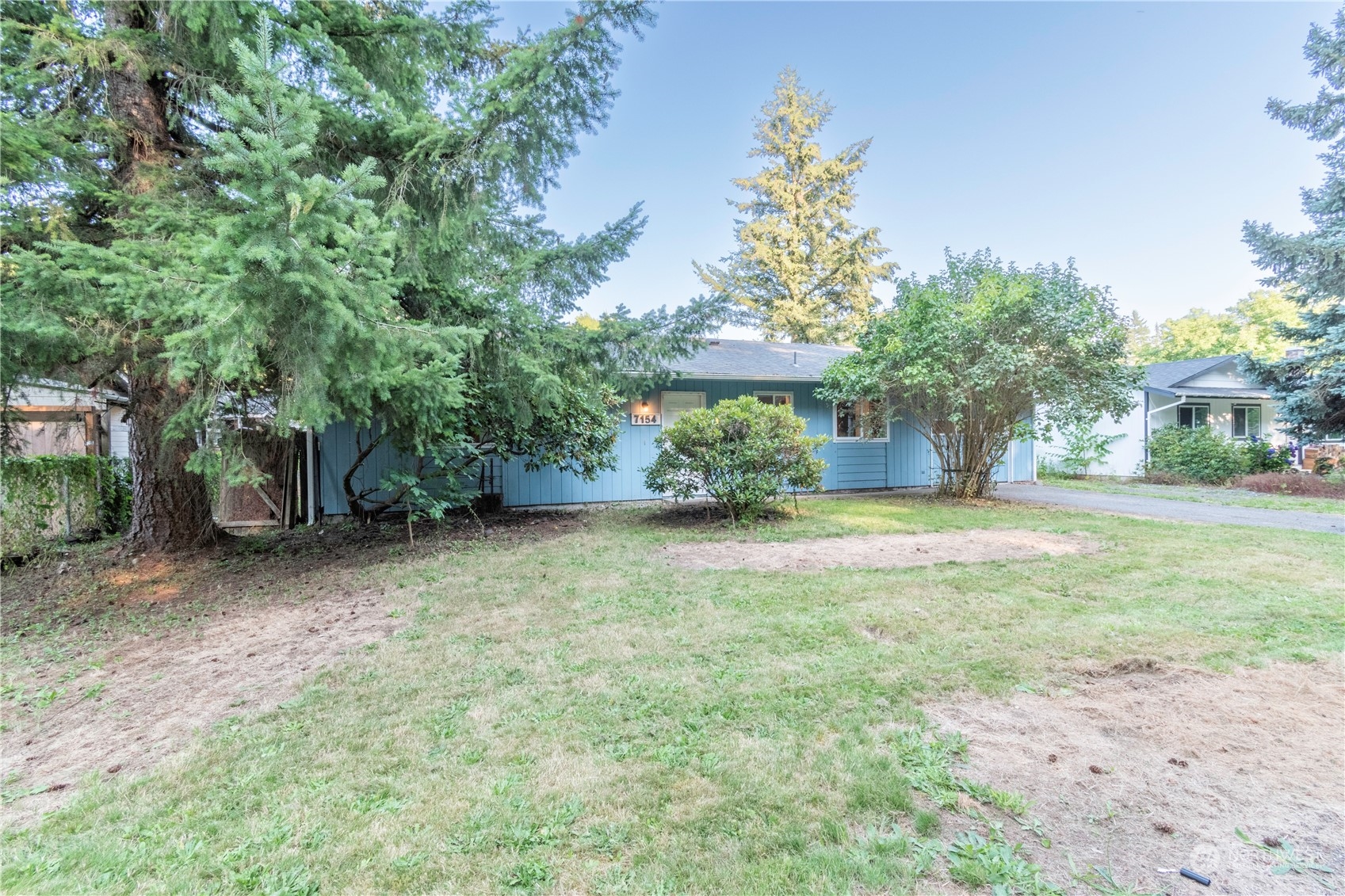 7154 Mecklem Road Everson, WA 98247 - Photo 22 of 25 a view of a house with backyard and a tree