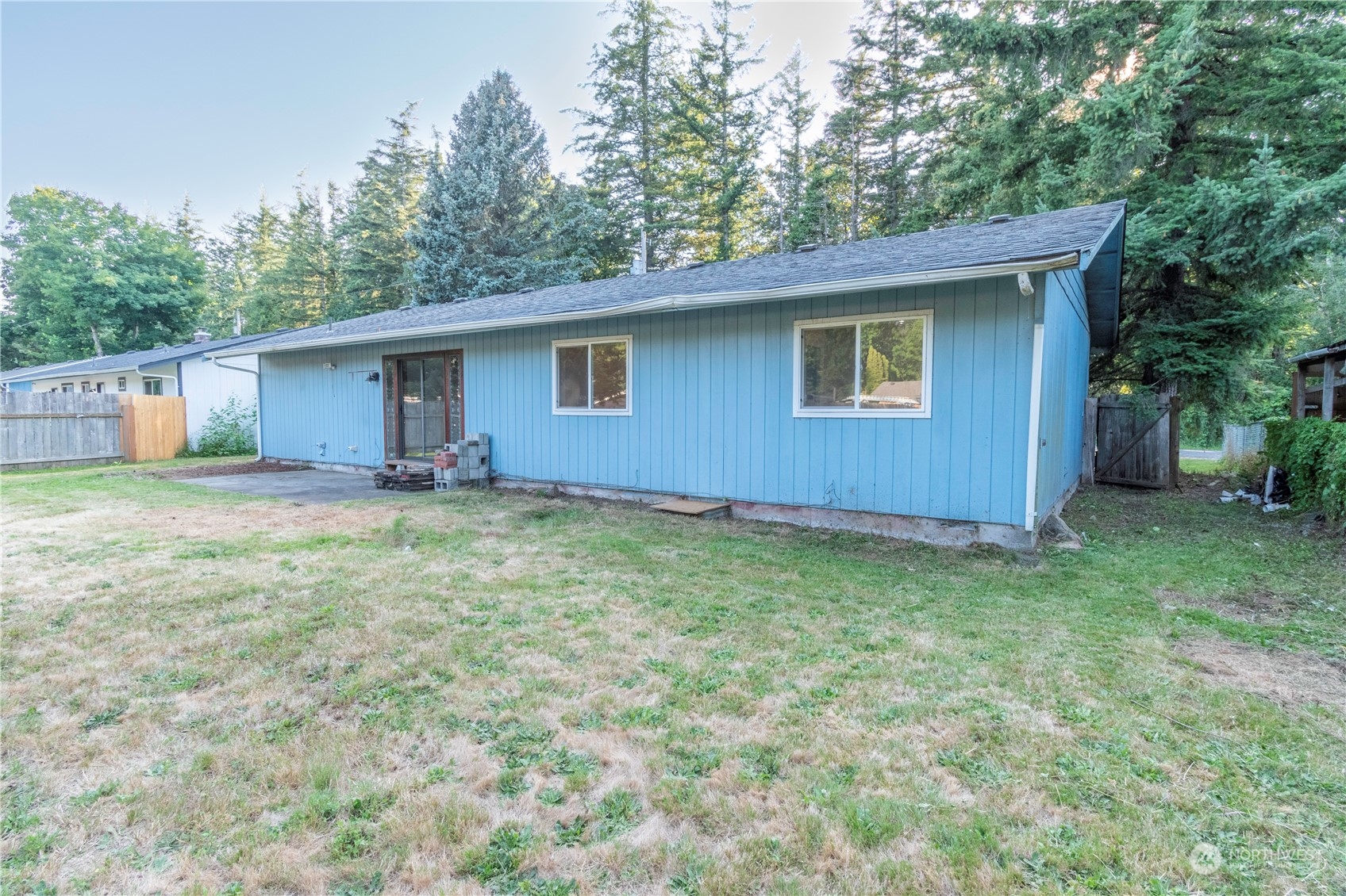 7154 Mecklem Road Everson, WA 98247 - Photo 24 of 25 a house with huge green field in front of it