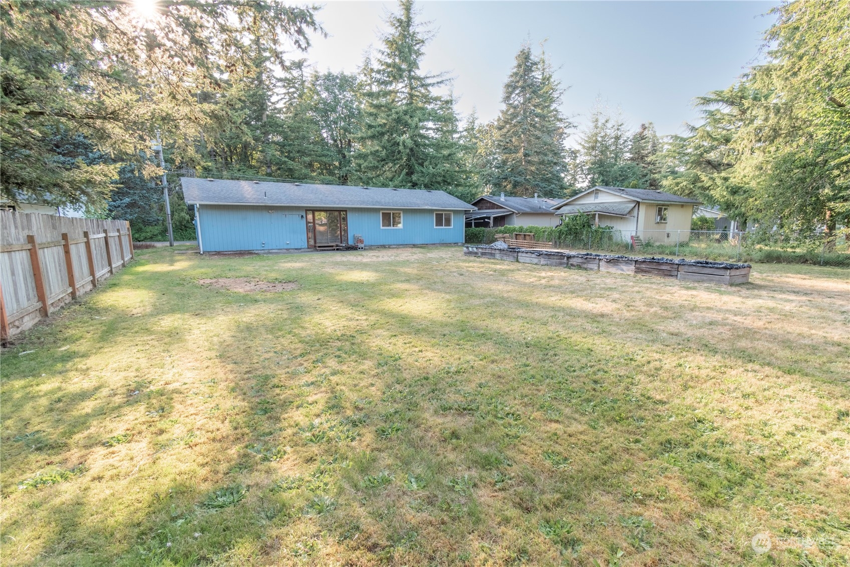 7154 Mecklem Road Everson, WA 98247 - Photo 3 of 25 a front view of a house with a garden
