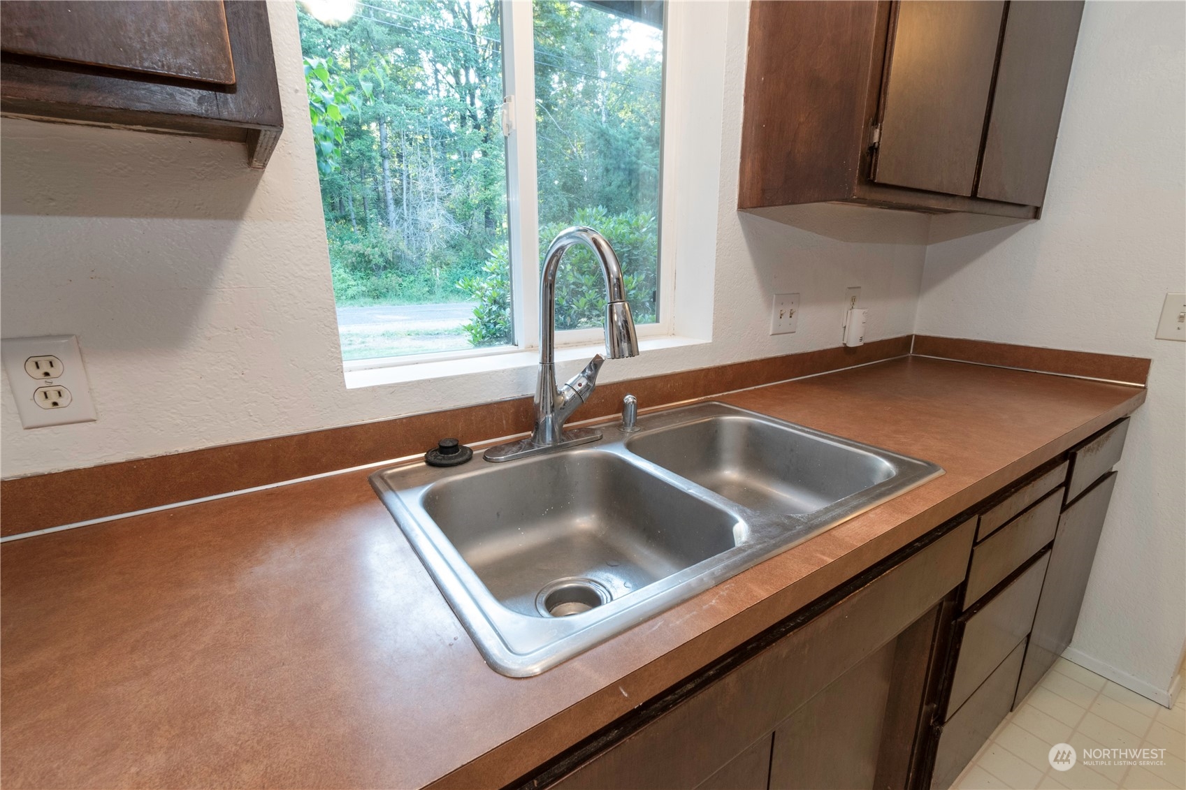 7154 Mecklem Road Everson, WA 98247 - Photo 8 of 25 a kitchen with a sink and a window
