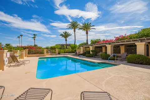 a view of a house with swimming pool