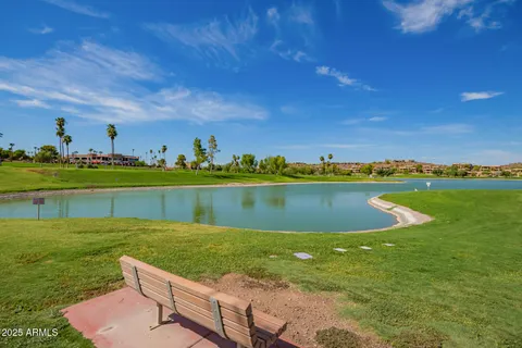 a view of a lake with a big yard