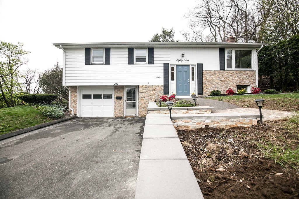 84 Bemis Road Holyoke, MA 01040 - Photo 1 of 30 a front view of a house with a yard