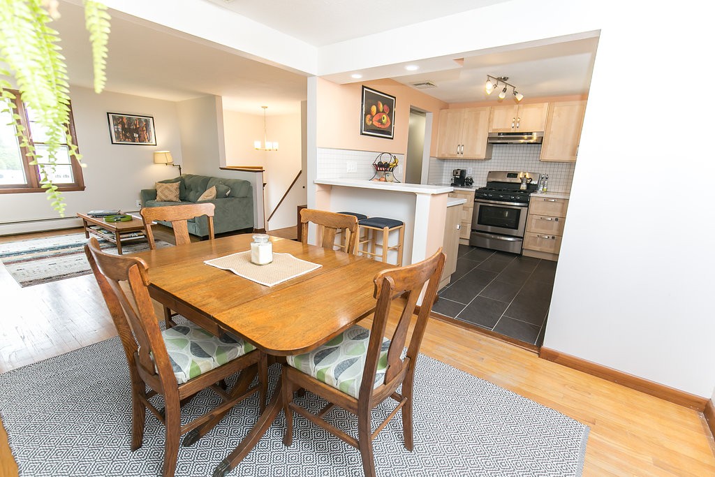 84 Bemis Road Holyoke, MA 01040 - Photo 11 of 30 a view of a dining room with furniture and wooden floor