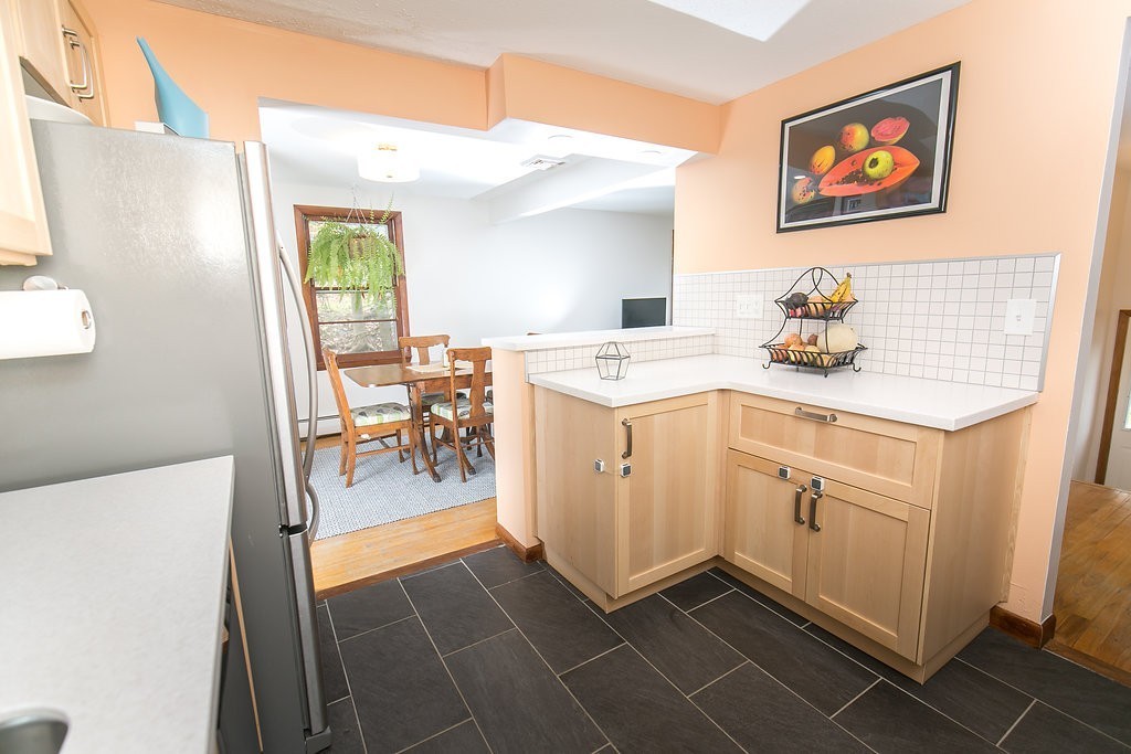 84 Bemis Road Holyoke, MA 01040 - Photo 16 of 30 a utility room with cabinets washer and dryer