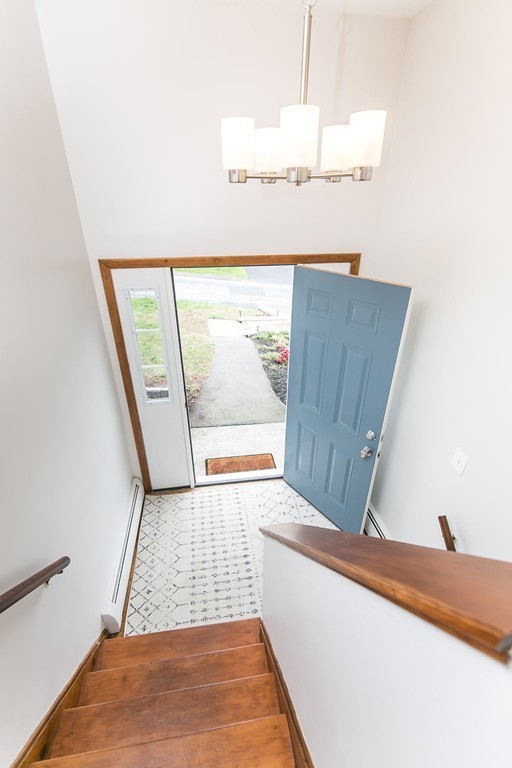 84 Bemis Road Holyoke, MA 01040 - Photo 24 of 30 a view of a hallway with a large window