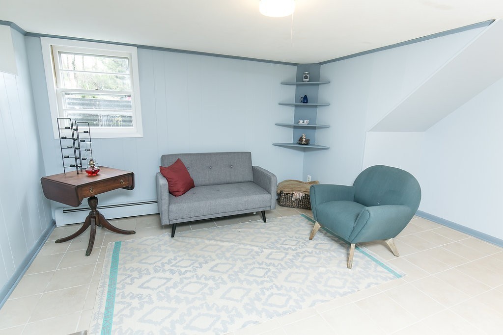 84 Bemis Road Holyoke, MA 01040 - Photo 26 of 30 a living room with furniture and a chair