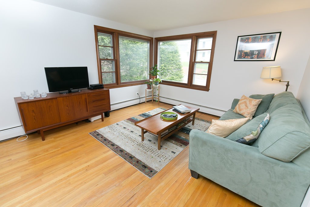 84 Bemis Road Holyoke, MA 01040 - Photo 8 of 30 a living room with furniture and a flat screen tv