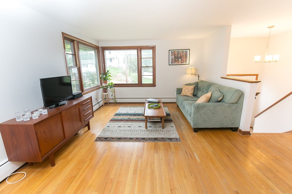 84 Bemis Road Holyoke, MA 01040 - Photo 9 of 30 a living room with furniture and a flat screen tv