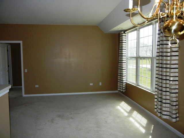 13468 Delaney Road Huntley, IL 60142 - Photo 12 of 17 a view of an empty room with a window