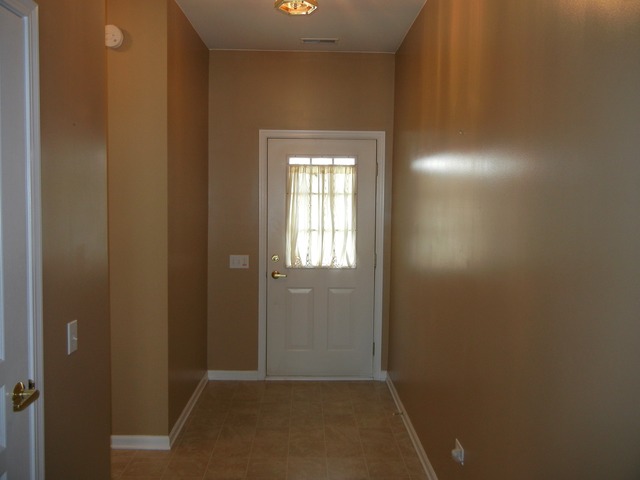 13468 Delaney Road Huntley, IL 60142 - Photo 10 of 17 an empty room that has a window in it