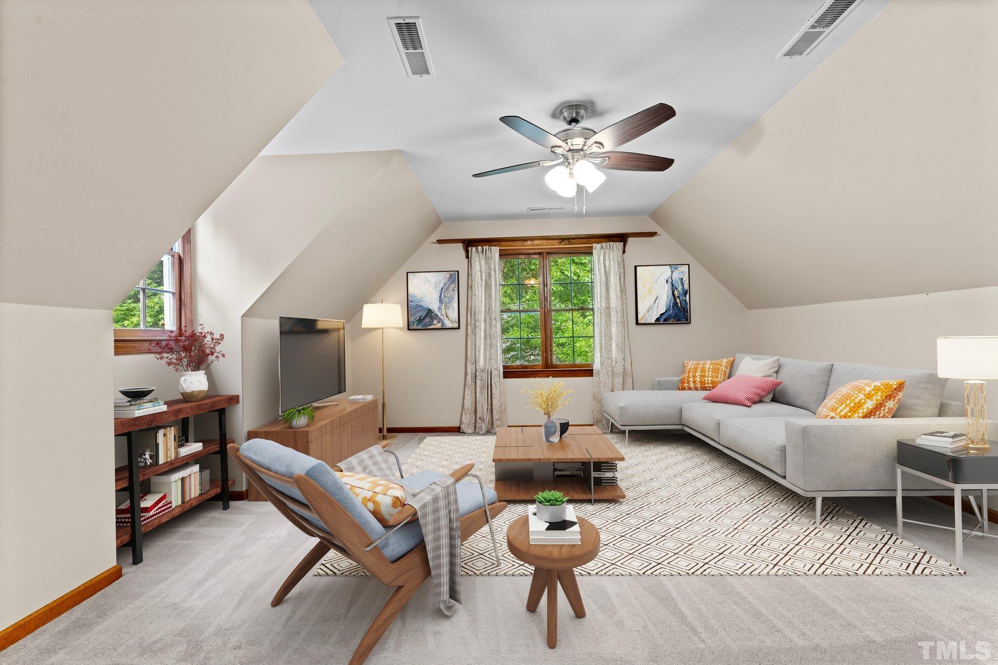 8317 Dunwood Court Raleigh, NC 27613 - Photo 28 of 50 a living room with furniture and a large window