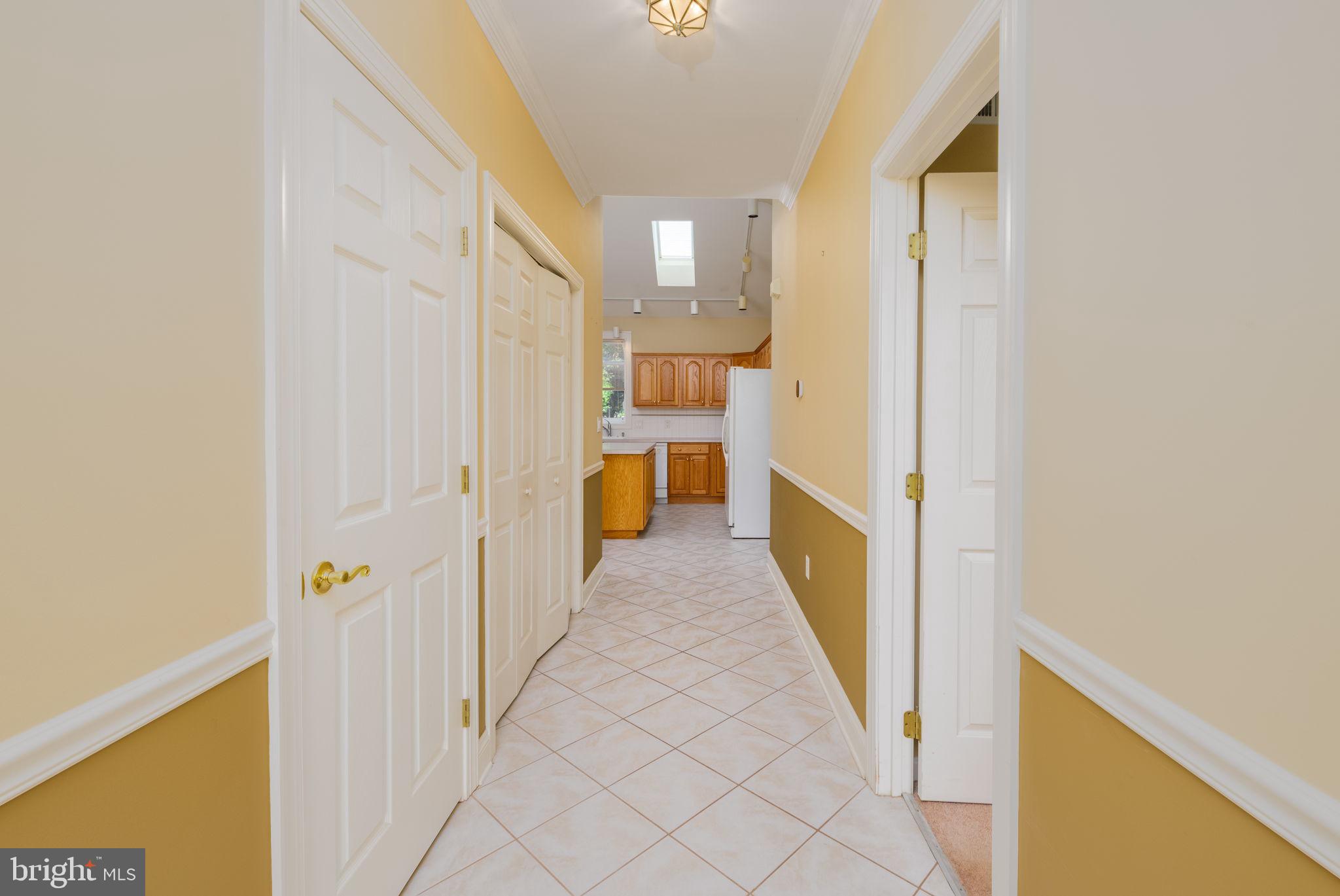 16841 Devon Road Lewes, DE 19958 - Photo 9 of 43 a view of a hallway with white walls