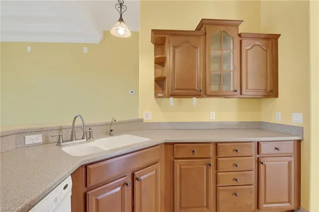 a bathroom with a sink a vanity and a mirror
