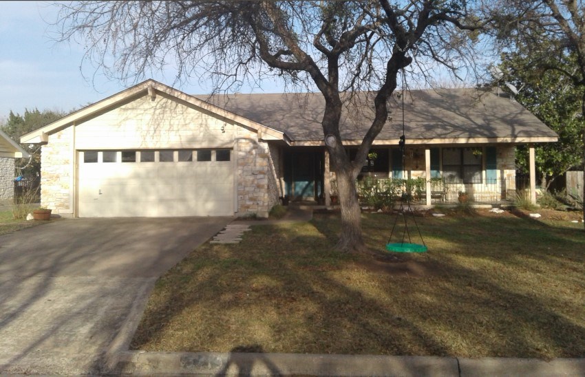 a view of backyard of house