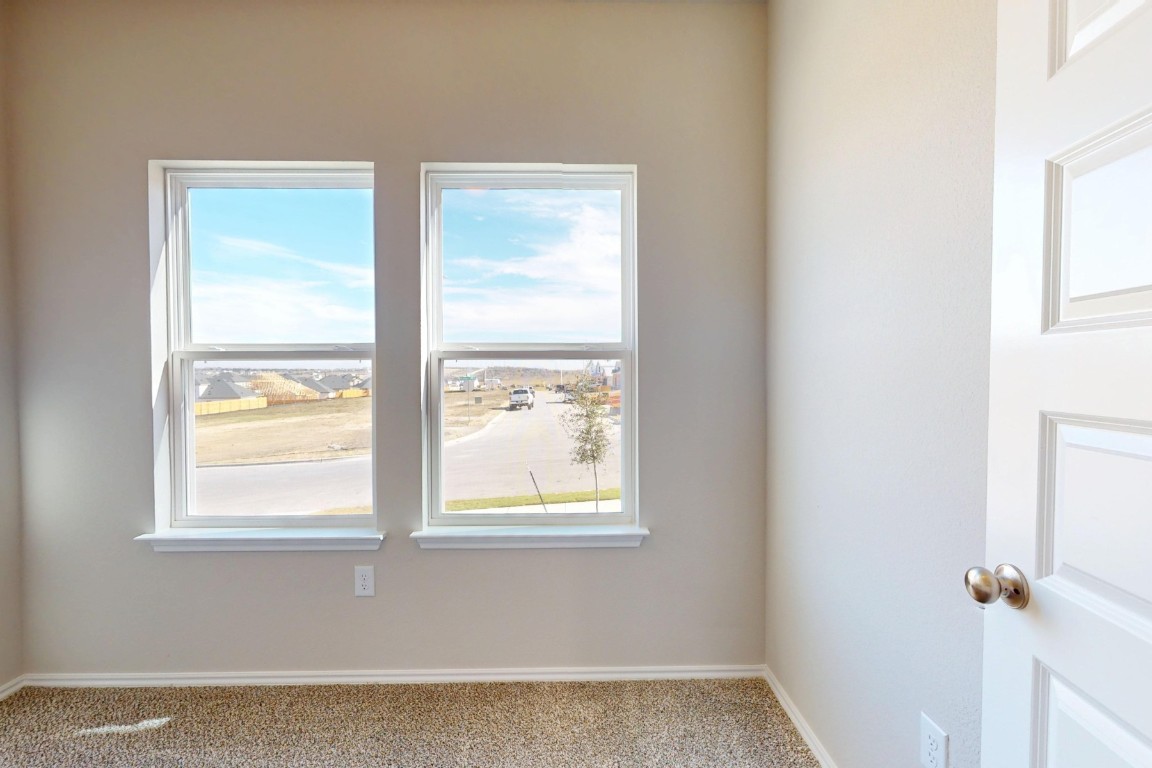 12300 Dillon Fls Drive Austin, TX 78747 - Photo 12 of 40 a view of a small space with a window