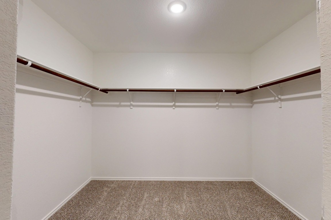 12300 Dillon Fls Drive Austin, TX 78747 - Photo 23 of 40 a view of a room with racks on the wall