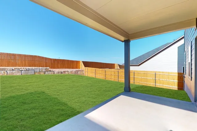 a view of a backyard with a garden