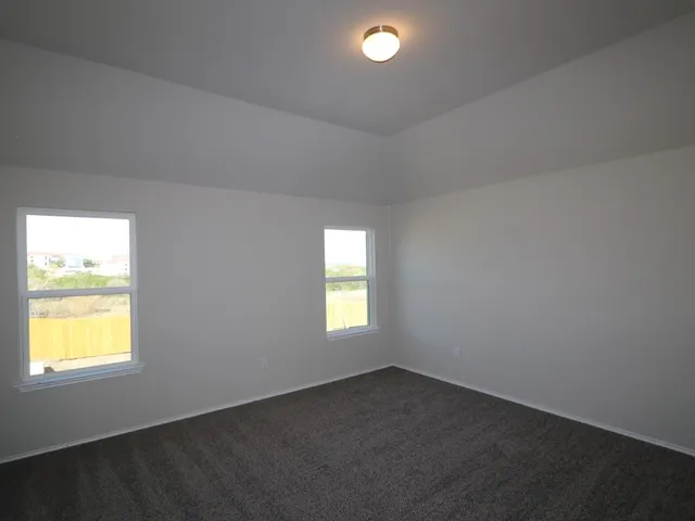 an empty room that has a window