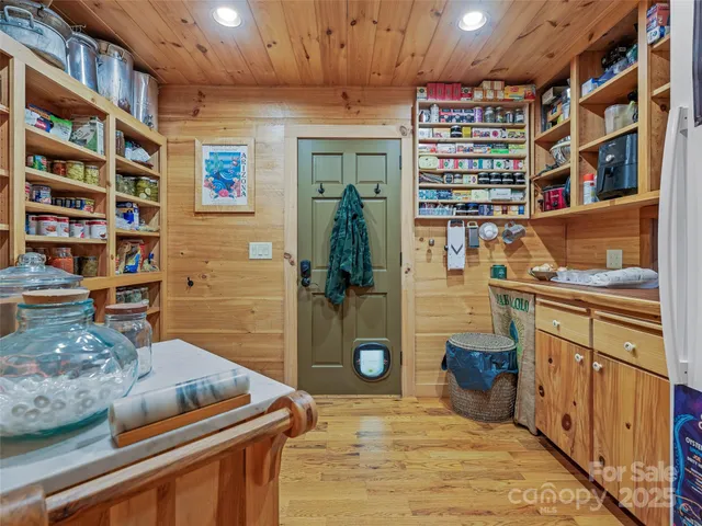 a kitchen with stainless steel appliances granite countertop a stove and a refrigerator