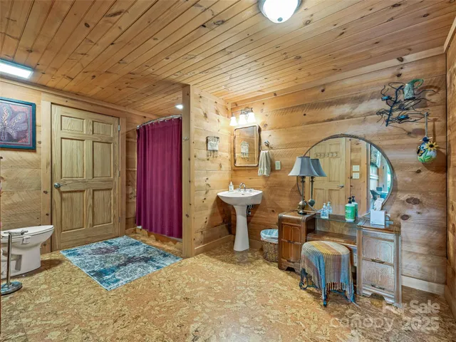 a front view of a house with a yard table and chairs