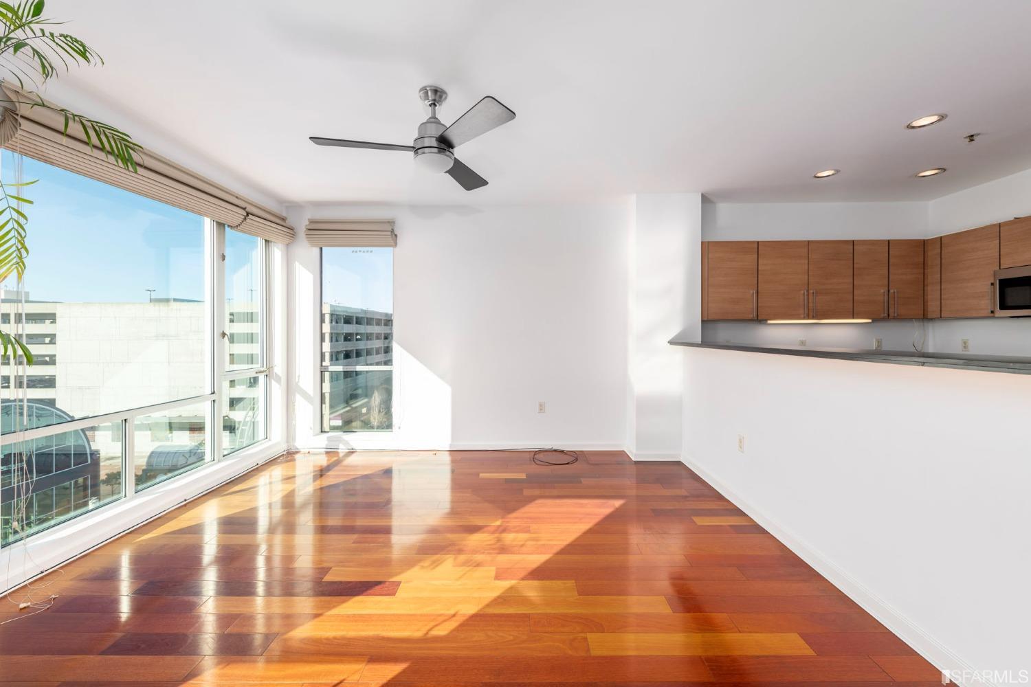 200 2nd Street, Unit 514 Oakland, CA 94607 - Photo 6 of 26 a view of a kitchen with a sink and windows