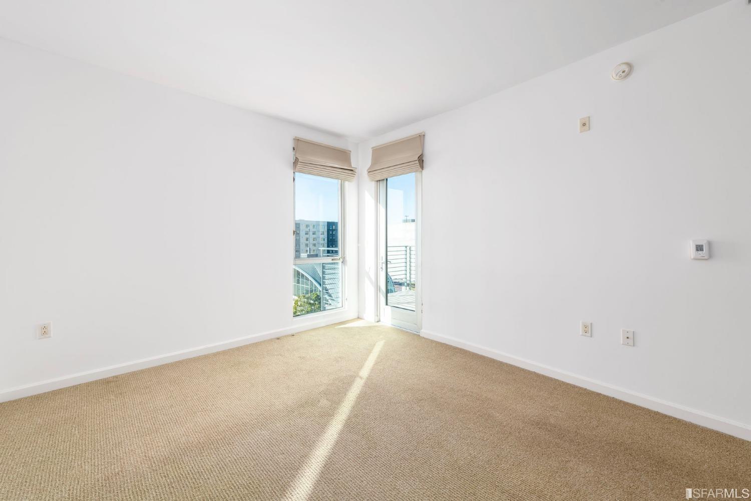 200 2nd Street, Unit 514 Oakland, CA 94607 - Photo 9 of 26 a view of an empty room with a window