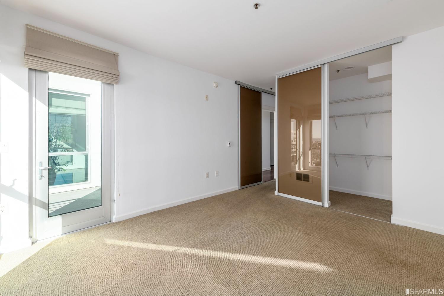 200 2nd Street, Unit 514 Oakland, CA 94607 - Photo 10 of 26 an empty room with windows