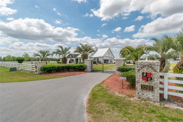 a living room with furniture kitchen and a window