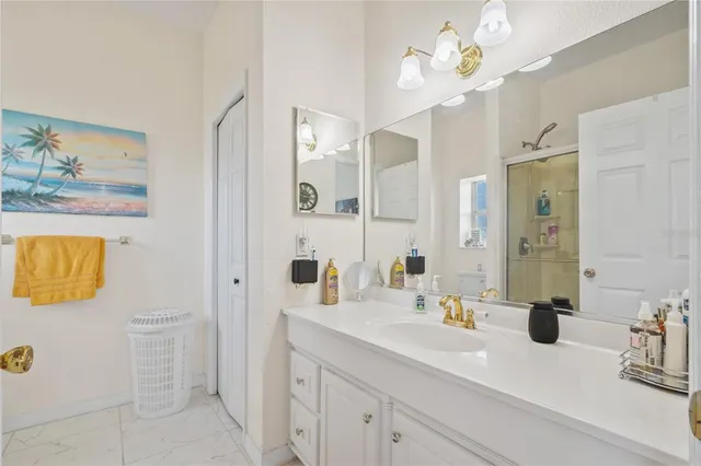 an aerial view of a house with outdoor space