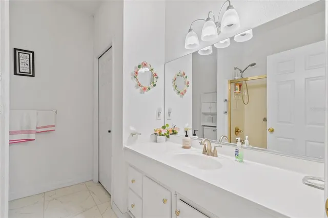 a view of a swimming pool with a garden