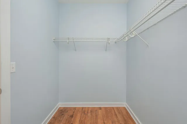 a view of an empty walk in closet
