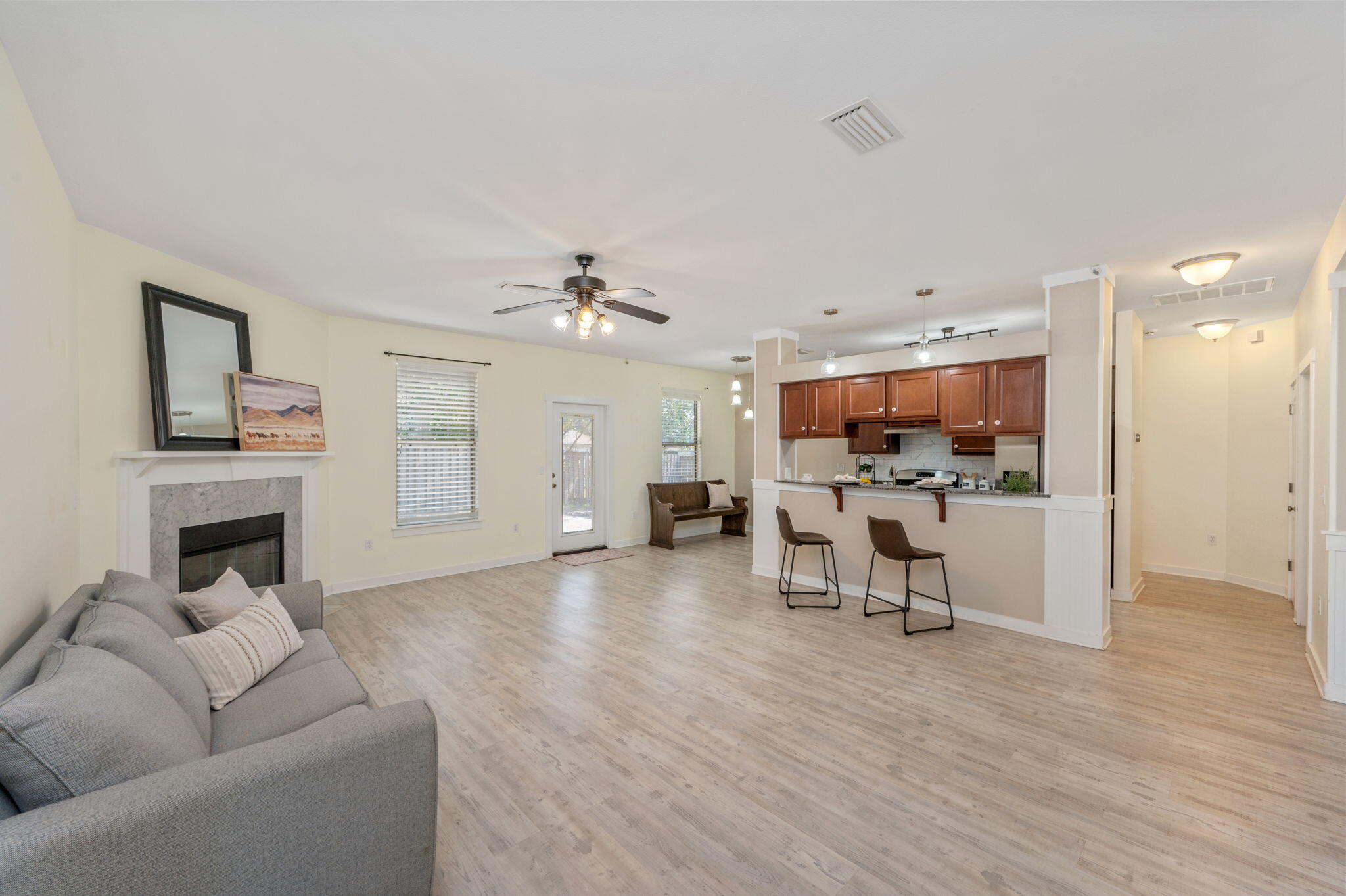 318 Key Lime Place Crestview, FL 32536 - Photo 5 of 30 a living room with furniture and a fireplace