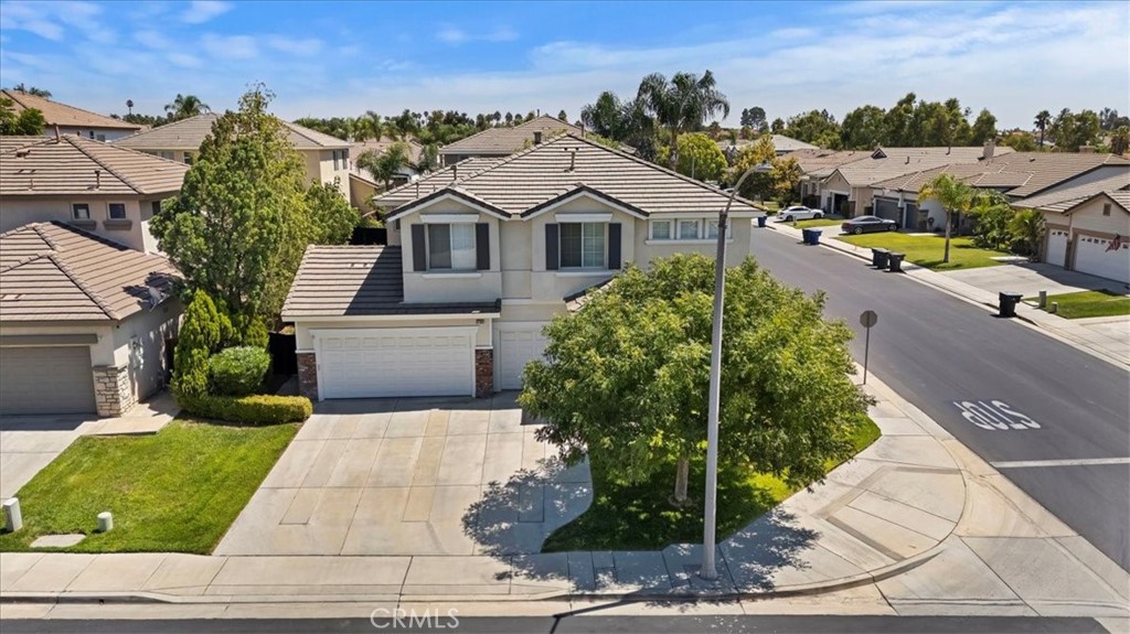 8794 Redcliff Place Riverside, CA 92508 - Photo 1 of 1 a front view of a house with a yard