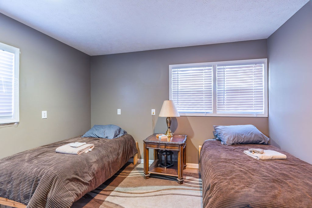 8496 South Madisonville Road Crofton, KY 42217 - Photo 10 of 22 a bedroom with a bed and a window