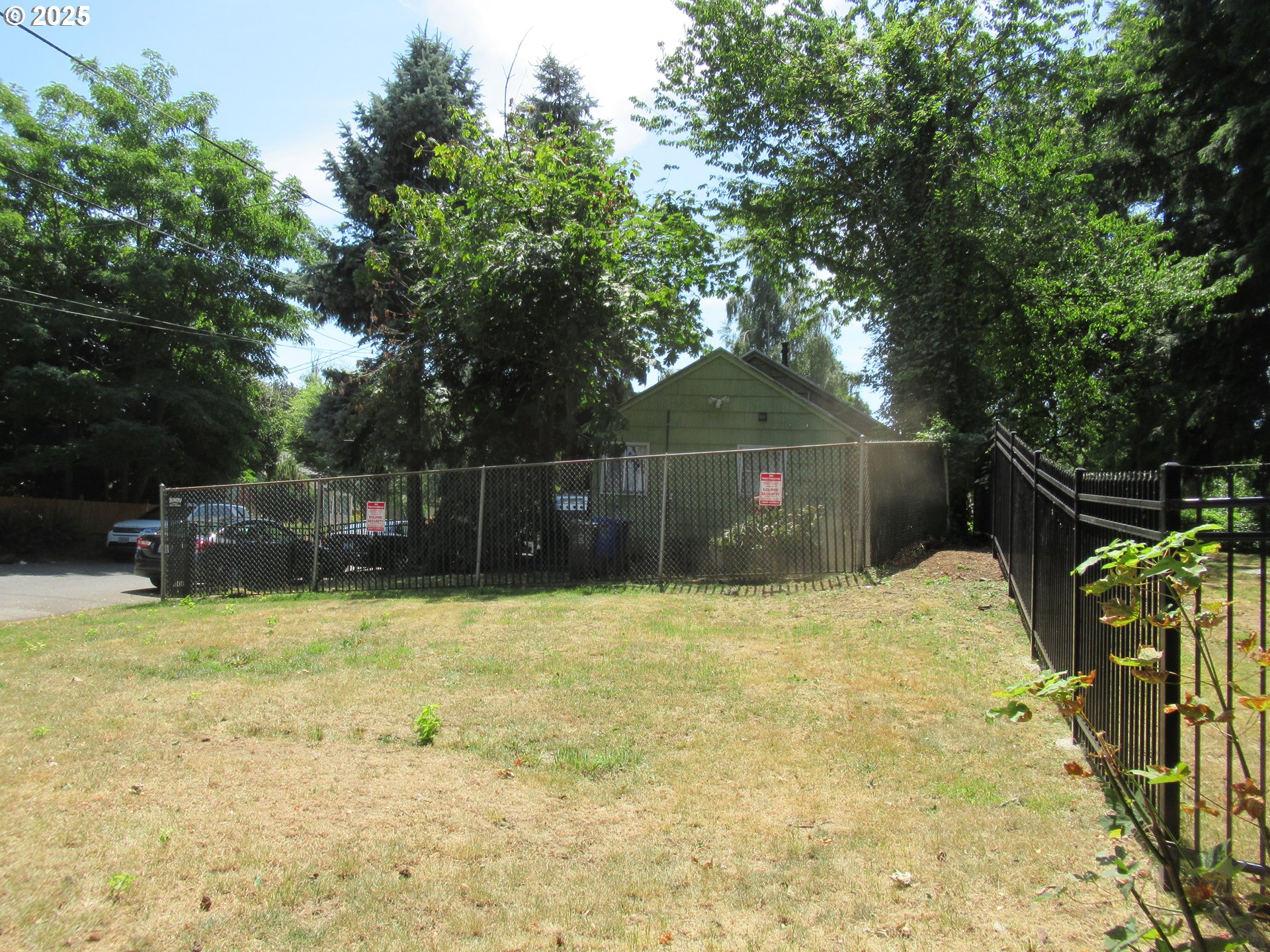 Northeast 99th Avenue Portland, OR 97220 - Photo 2 of 3 a backyard of a house with lots of green space
