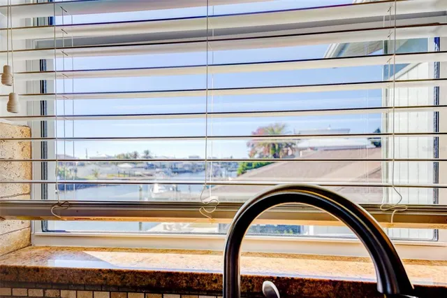 a close view of fireplace and tap