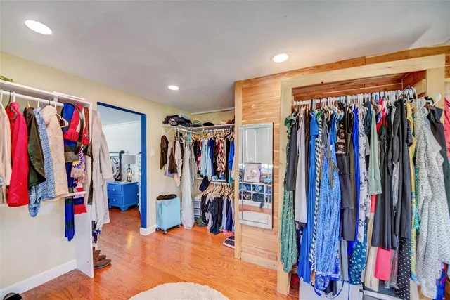 a porch with a table and chairs