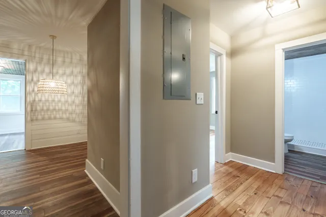 a kitchen with granite countertop a sink and steel appliances